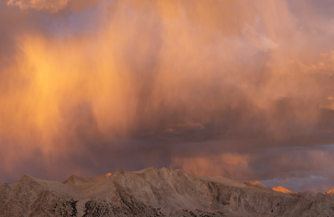 Alpenglow burning across the Sierra ridgeline at sunset