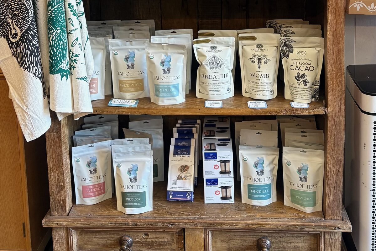 Tahoe Teas pouches on the shelves of a Tahoe market alongside other local goods